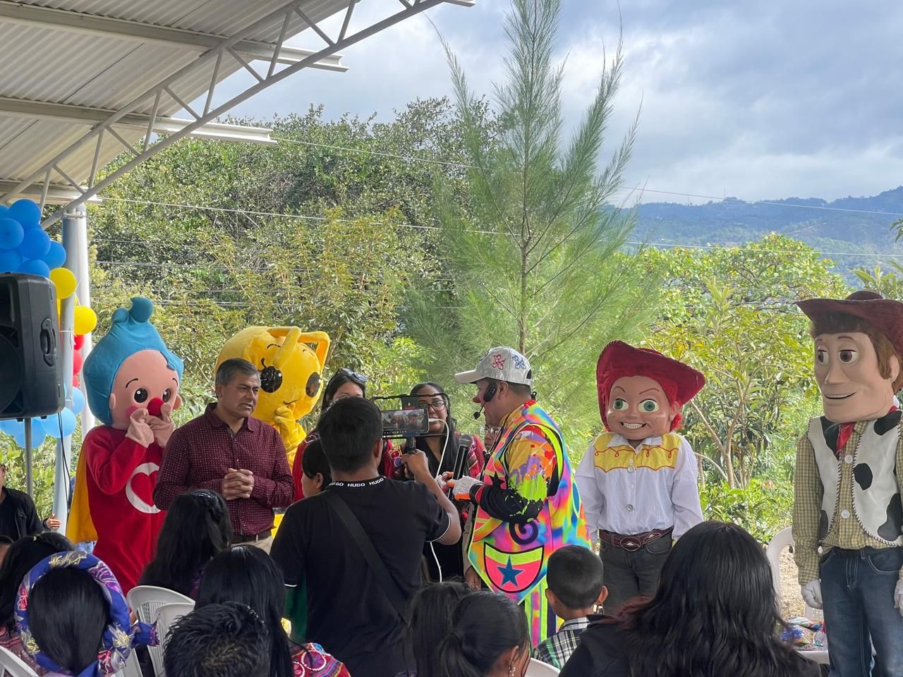 Costumed characters with children and families